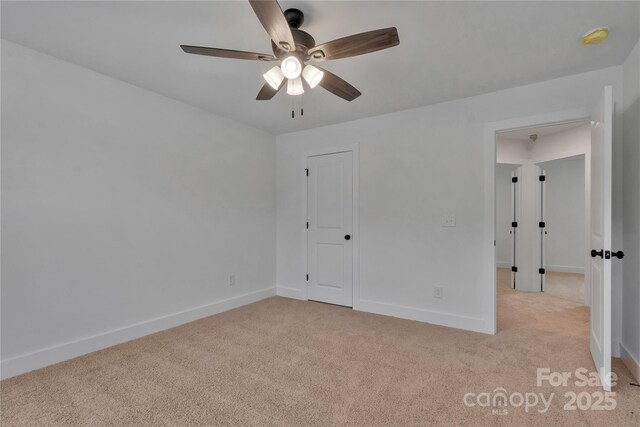 425 Messner St, Salisbury, NC 28144 - unfurnished bedroom with light colored carpet, baseboards, and a ceiling fan