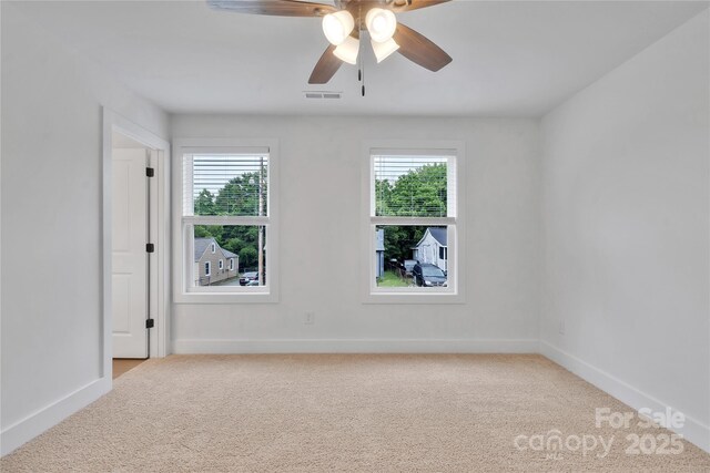 425 Messner St, Salisbury, NC 28144 - spare room featuring healthy amount of natural light, carpet, ceiling fan, and baseboards