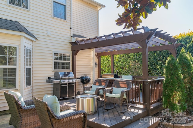 wooden terrace with a grill and a pergola