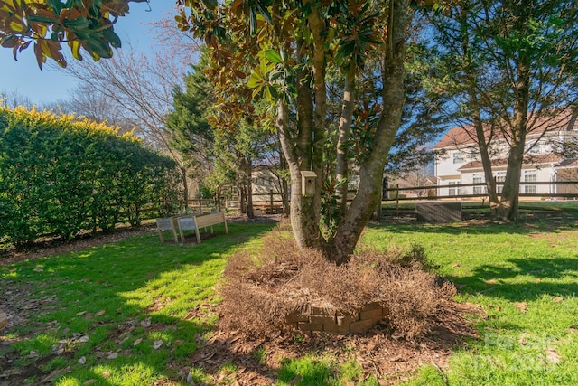 view of yard with fence