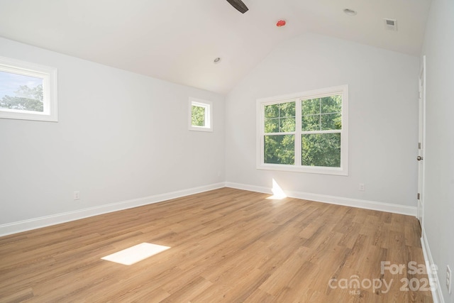 110 Walters St, Huntersville, NC 28078 - spare room featuring light wood-style flooring, baseboards, and lofted ceiling