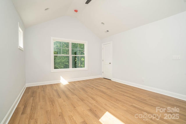 110 Walters St, Huntersville, NC 28078 - spare room with light wood-type flooring, lofted ceiling, and baseboards