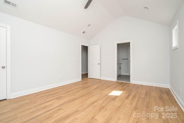 110 Walters St, Huntersville, NC 28078 - unfurnished bedroom with vaulted ceiling, light wood-type flooring, connected bathroom, baseboards, and a ceiling fan
