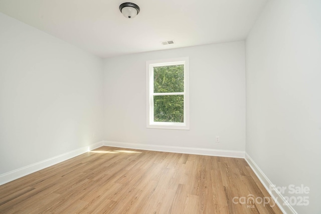 110 Walters St, Huntersville, NC 28078 - spare room featuring light wood-style floors and baseboards