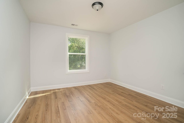 110 Walters St, Huntersville, NC 28078 - empty room featuring light wood-style flooring and baseboards