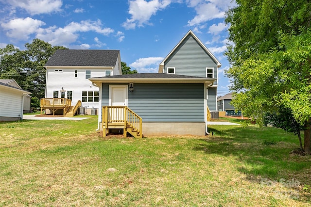 110 Walters St, Huntersville, NC 28078 - back of house with a lawn, a wooden deck, and entry steps