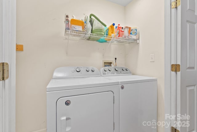 laundry room featuring laundry area and washing machine and dryer