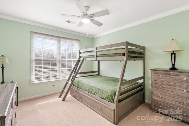 bedroom featuring light carpet, baseboards, visible vents, and crown molding