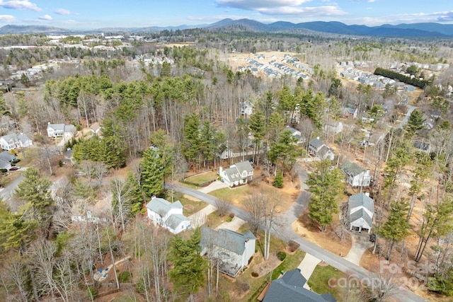 drone / aerial view featuring a mountain view