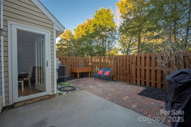 view of patio / terrace featuring fence