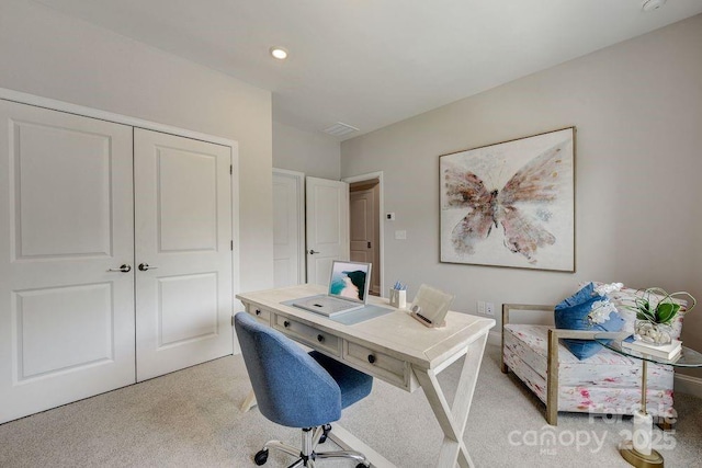 home office featuring visible vents, recessed lighting, and light carpet