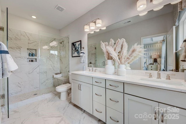 bathroom with visible vents, marble finish floor, a sink, and a marble finish shower