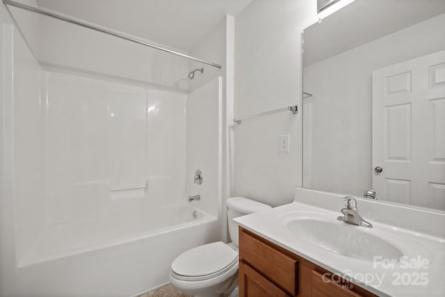 bathroom with shower / bathtub combination, vanity, and toilet