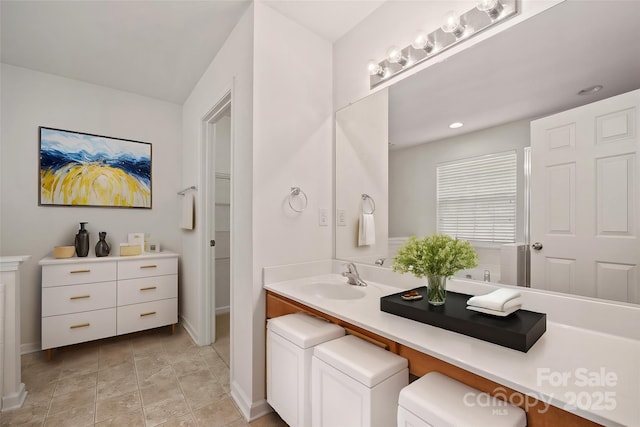 full bathroom featuring recessed lighting, a spacious closet, and vanity