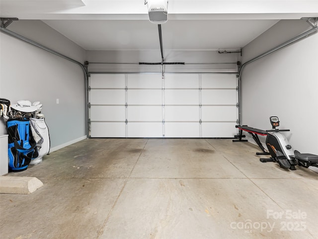 garage featuring a garage door opener