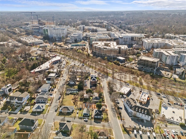 birds eye view of property featuring a city view