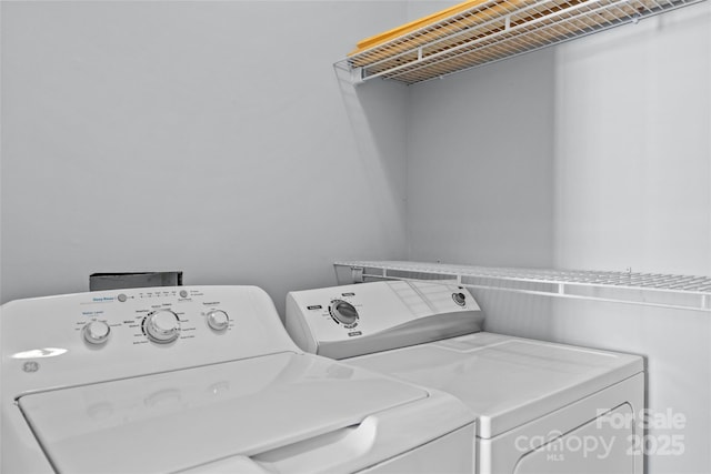 laundry room featuring laundry area and independent washer and dryer