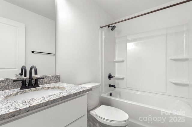 full bathroom with  shower combination, toilet, and vanity