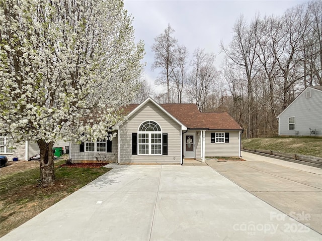 5610 Stone Bluff Ct, Charlotte, NC 28214 - view of front of house with a shingled roof