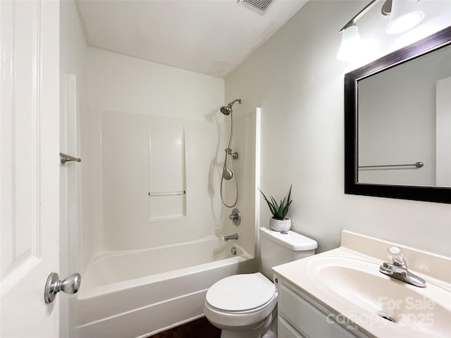 full bath featuring vanity, bathing tub / shower combination, toilet, and visible vents