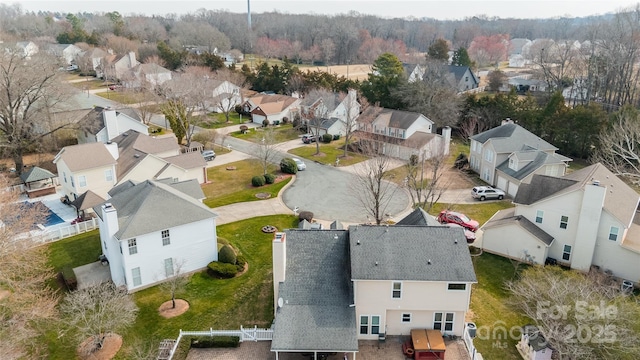 drone / aerial view with a residential view