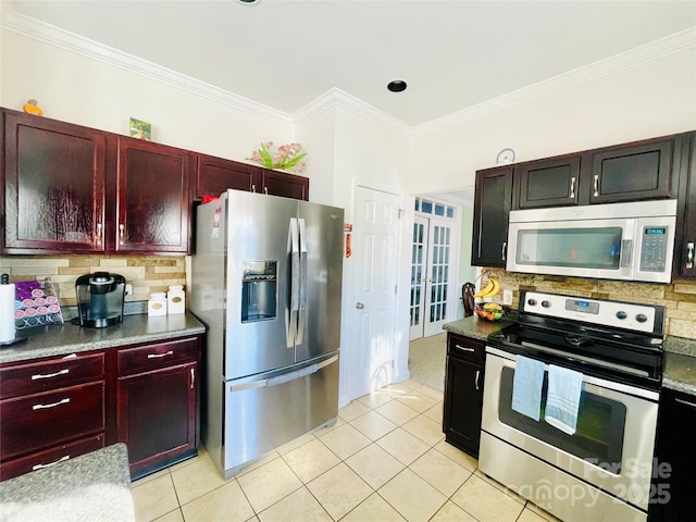 kitchen with appliances with stainless steel finishes, reddish brown cabinets, crown molding, and decorative backsplash