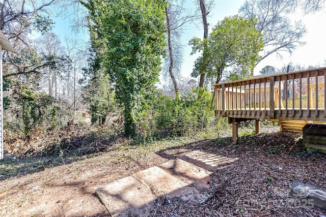 view of yard with a deck