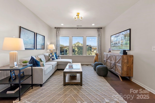 living room with recessed lighting, wood finished floors, visible vents, and baseboards