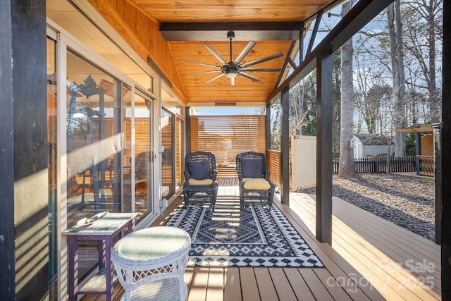 exterior space with lofted ceiling, wooden ceiling, and ceiling fan