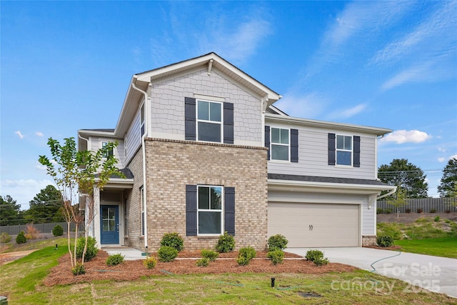 view of front of home featuring a garage, brick siding, fence, concrete driveway, and a front yard