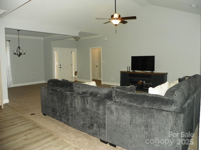 128 Summerlake Dr, New London, NC 28127 - living area with high vaulted ceiling, a ceiling fan, baseboards, light wood-style floors, and crown molding