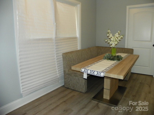 128 Summerlake Dr, New London, NC 28127 - dining space featuring breakfast area and dark wood-style flooring