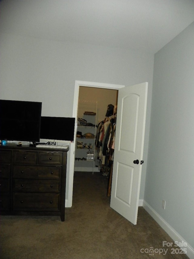 128 Summerlake Dr, New London, NC 28127 - carpeted bedroom with a closet, a spacious closet, and baseboards