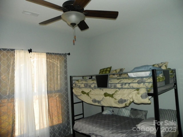 128 Summerlake Dr, New London, NC 28127 - bedroom featuring visible vents and ceiling fan
