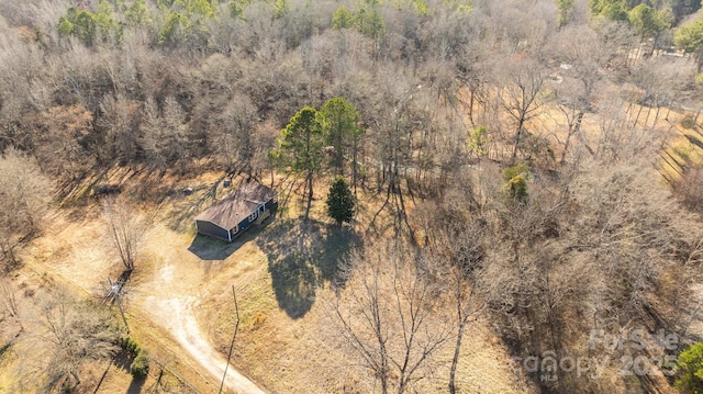 bird's eye view featuring a view of trees