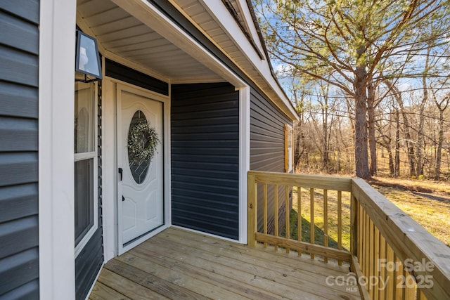 doorway to property with a deck