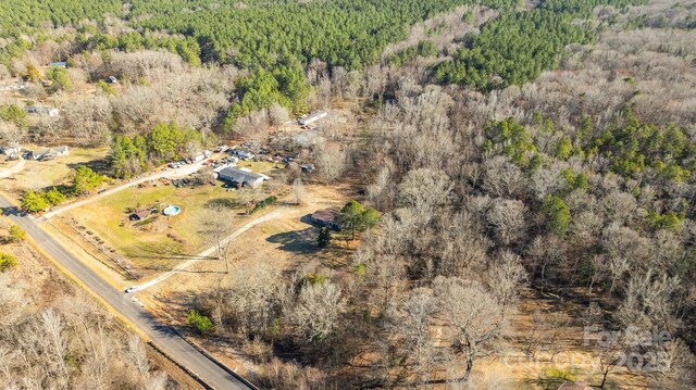 drone / aerial view with a forest view