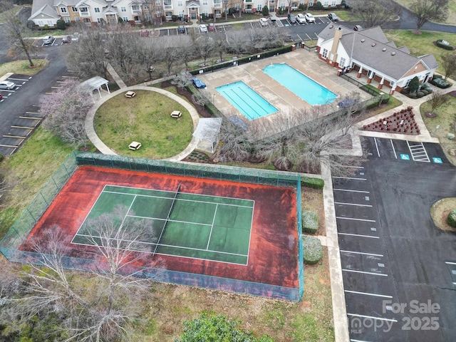 birds eye view of property with a residential view