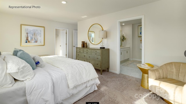 bedroom with light carpet, ensuite bath, baseboards, and recessed lighting