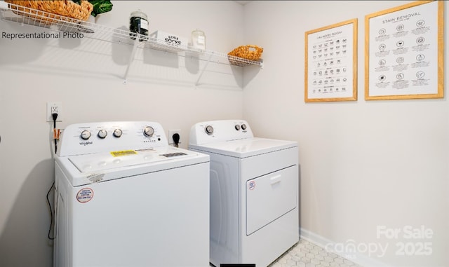 laundry room featuring laundry area and washing machine and clothes dryer