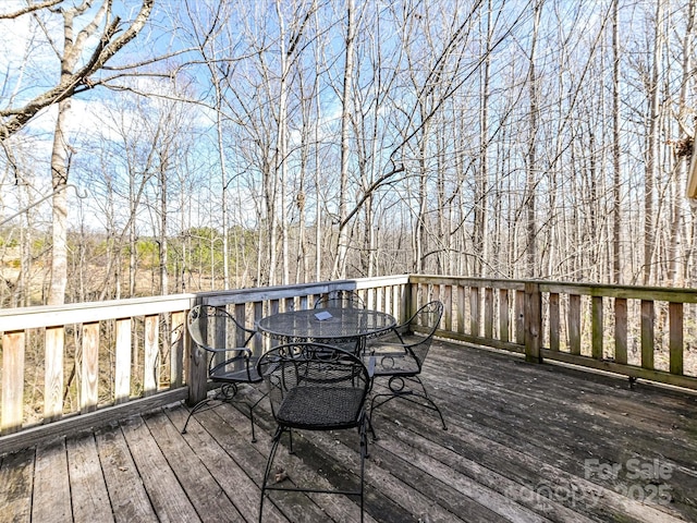 deck featuring outdoor dining space