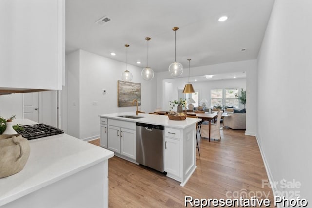 116 Shay Crossing Rd Unit 2P, Salisbury, NC 28144 - kitchen featuring stainless steel dishwasher, white cabinetry, stovetop, light wood-style flooring, and recessed lighting