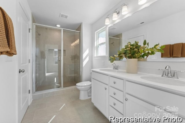 116 Shay Crossing Rd Unit 2P, Salisbury, NC 28144 - bathroom featuring tile patterned flooring, double vanity, and a stall shower