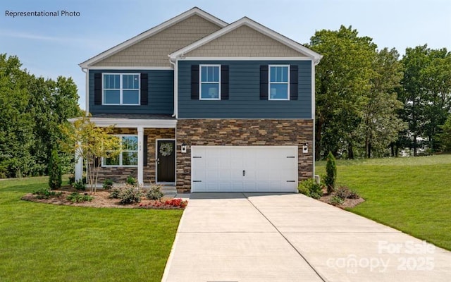 craftsman house with driveway, stone siding, a garage, and a front lawn