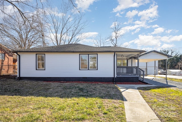 view of front facade featuring a porch, a front yard, and crawl space