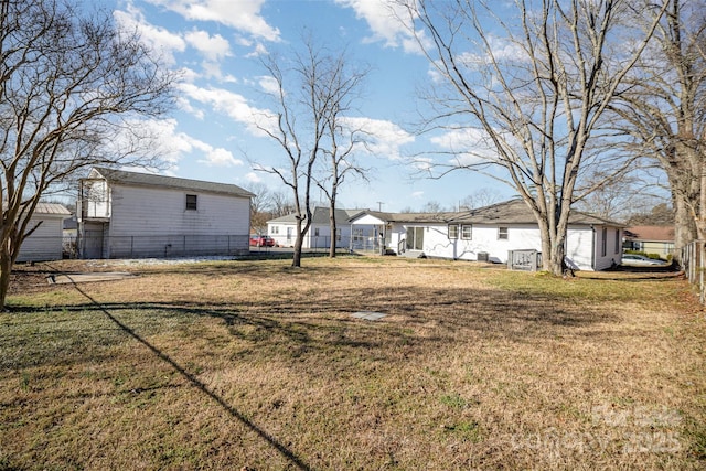 view of yard with fence