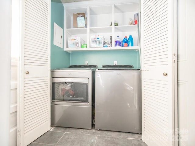 clothes washing area featuring laundry area and independent washer and dryer