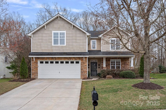 traditional-style home featuring driveway, a garage, stone siding, roof with shingles, and a front yard