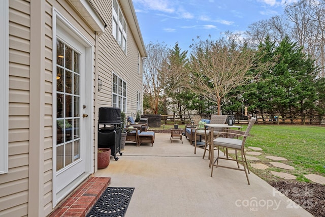 view of patio featuring grilling area and outdoor lounge area