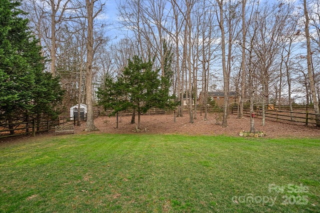 view of yard with fence